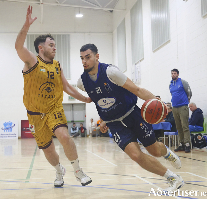 Titans&rsquo; Matthew Sweeney and Maree&rsquo;s Rinor Dragusha in action from the Domino's Men's Division 1 National Cup game at Calasanctius College, Oranmore last November. (Photo: Mike Shaughnessy)