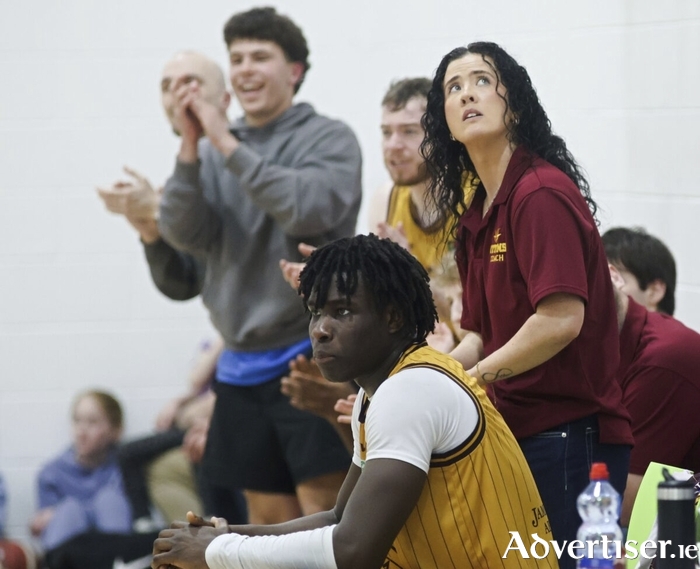 Titans&rsquo; coach Erin Bracken watches the clock as her team edge closer to winning in the Basketball Ireland Domino&rsquo;s National League Division 1 play offs game against Maree at Calasanctius College last Saturday night. (Photo: Mike Shaughnessy)