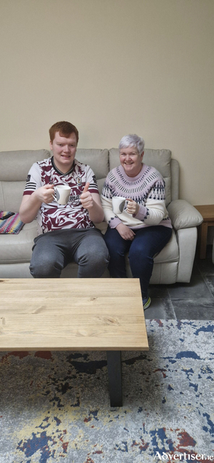 Nicola is pictured enjoying a cuppa with DJ.