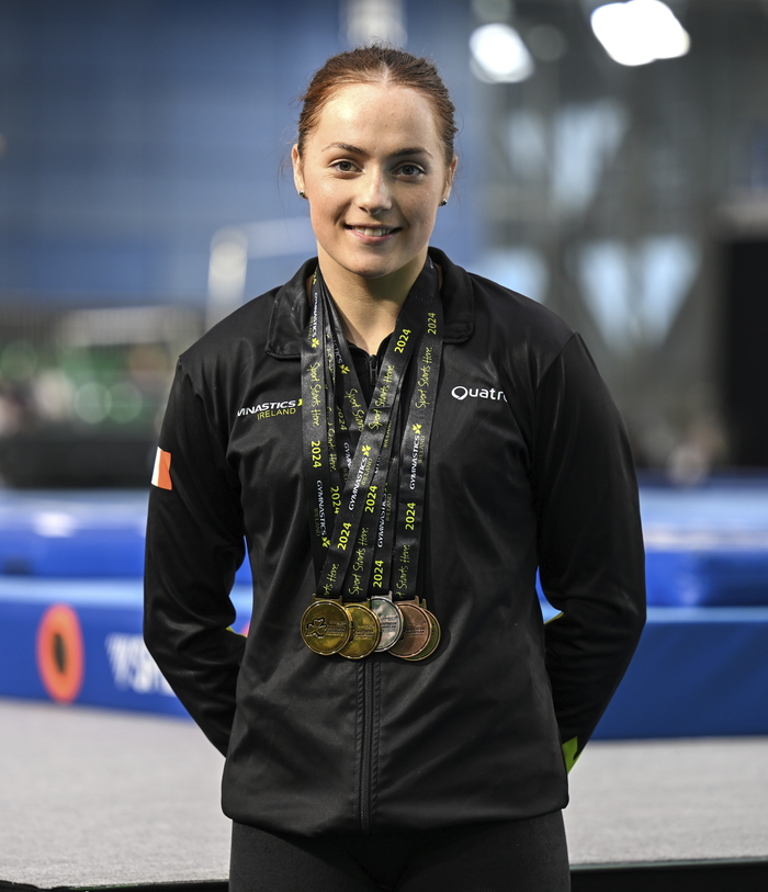 Emma Slevin of Ireland poses with the five medals she won during the Gymnastics Ireland hosted Northern European Championships 2024 at the National Indoor Arena on the Sport Ireland Campus in Dublin. (Photo by Stephen McCarthy/Sportsfile)