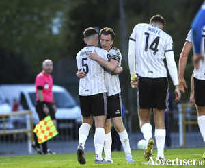 Killian Brouder of Galway United, left, is congratulated by teammate David Hurley after scoring his sides first goal during the SSE Airtricity Men's Premier Division match between Waterford and Galway United at the RSC in Waterford. (Photo by Michael P Ryan/Sportsfile)