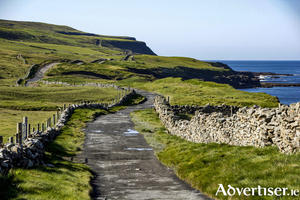 Footpath leading from the small town Doolin to the Cliffs of Moher, County Clare, Ireland