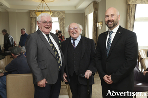 Tom Kenny, Historian; Former President Michael D. Higgins; and Brian Donnellan at the reception for the Civic Commemorations in honour of Tommy Keane and Arthur Colahan.