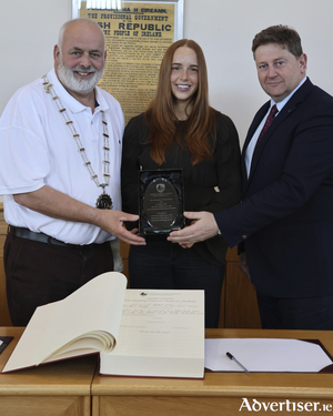 Cathaoirleach of the Ballinasloe M.D. Cllr. Peter Keaveney, Ms. Siobh&aacute;n Divilly, Mr. Damien Mitchell, Director of Housing. Credit Gerry Stronge.