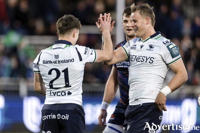 Sam Gilbert celebrates with Matthew Devine after he scores a try during the URC match against Edinburgh at Hive Stadium. (Photo by Mark Scates/Sportsfile)