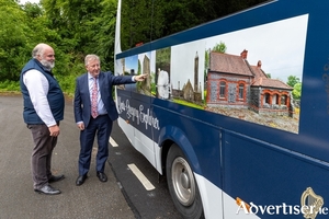 William Cormacan, Divisional Manager with the National Parks and Wildlife Service, and Minister of State Se&aacute;n Canney admire the new Yeats-Gregory Explorer shuttle bus at the official launch in Coole Park Nature Reserve. Photo: Natasha Barton.
