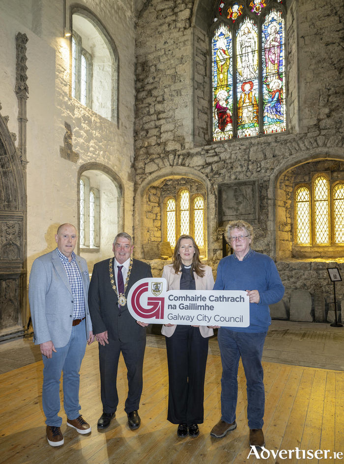 From left: Brendan Dunne, Galway City Council, Cllr John McDonagh, The Very Rev Lynda Peilow, and Dr Jim Higgins, Galway City Council, celebrate the announcement in St Nicholas' Collegiate Church.