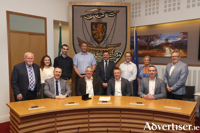 (L-R): Sitting Front Row: Chief Executive of Galway City Council, Leonard Cleary, Cllr. John McDonagh, Conor McNamara (Flynn Management), Alan Hogan (Flynn Management).
Back Row: Cllr. Donal Lyons, Caoimhe O&rsquo;Brien (Galway City Council), Callan Quinn (Galway City Council), Jimmy Callan (Galway City Council), Micheal Cormican (Galway City Council), Barry Hogge (AECOM), Emma Silke (Galway City Council), Barry O&rsquo;Riordan (Henry J Lyons) .