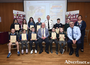 Winners in the Galway County Council Anti Litter competition. Pictured at the prize giving of the Galway County Council Anti-Litter Poster Competition 2026 were Front row, L-R Ellie Pa&ntilde;ka, St Marys NS Mountbellew, Emma Ryan, St. Annin&rsquo;s NS, D&oacute;nall Donnelly, St. Patrick&rsquo;s NS, Ballaghlea, Cllr. David Collins, Cathaoirleach of Galway County Council, Ben Connell, Clydagh NS, Hollie Connell, Clydagh NS and Mark Molloy, Galway County Council. Back row, L-R, Wiktoria Ozga, Col&aacute;iste Mhuire, Ballygar, Marie Hynes, Maree NS, Maeve Walsh, High Cross College, Sophie Corrigan, High Cross College, Christopher Harrington, Community Warden Supervisor, Patrick Canavan, Claddaghduff NS, &Eacute;ile R&oacute;s, Scoil Sailearna, and Mary McGann, Galway County Council. Photo: Ray Ryan