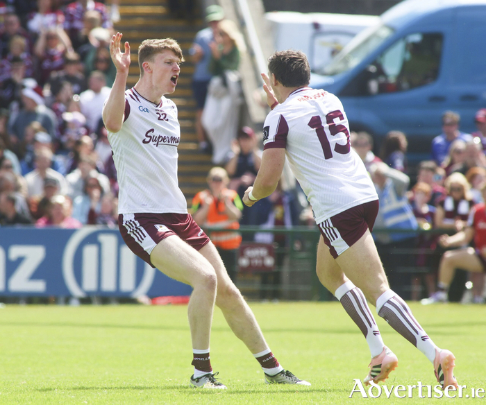 Daniel O&rsquo;Flaherty congratulates Shane Walsh on his goal against Westmeath in the GAA All-Ireland Senior Football Championship Round 2A game at Pearse Stadium. (Photo: Mike Shaughnessy)