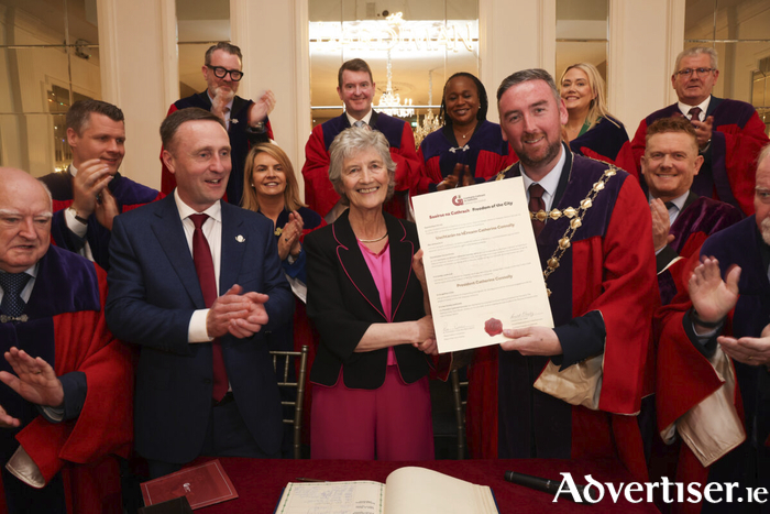 President of Ireland Catherine Connolly pictured with Mayor Mike Cubbard and City Council CEO Leonard Cleary when she was awarded the Freedom of the City of Galway on Friday. Full story on Page 34. Photograph by Aengus McMahon