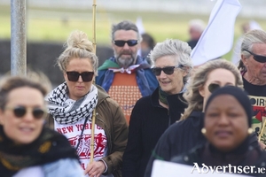 President Catherine Connolly walked with activists through South Park on Sunday. Photo: Mike Shaughnessy