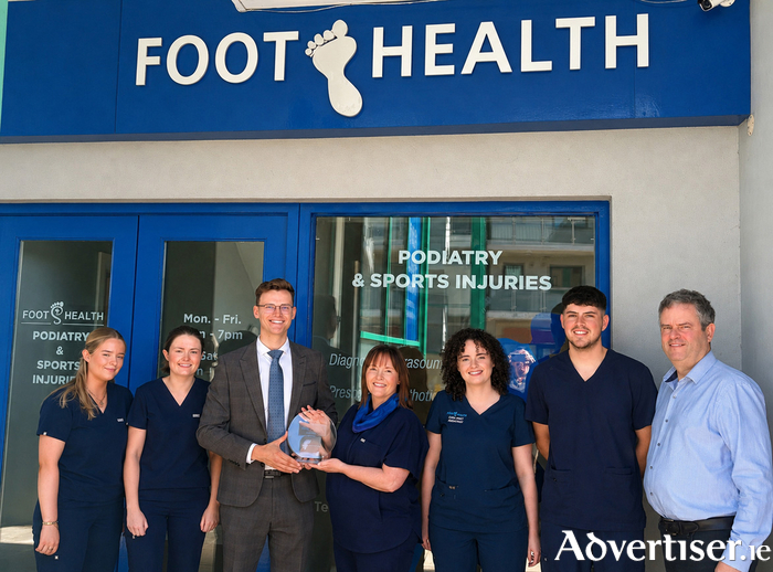 Deputy Albert Dolan is pictured presenting the team at Foot Health Podiatry Claregalway with their award as the first podiatry clinic in Ireland to achieve Age Friendly Business status.