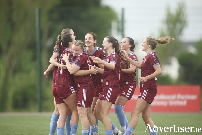 Aoibhinn Donnelly and Anna McGough hug in celebration of their win over Peamount United in the All Island Cup semi-final. (Photo: Mike Shaughnessy)