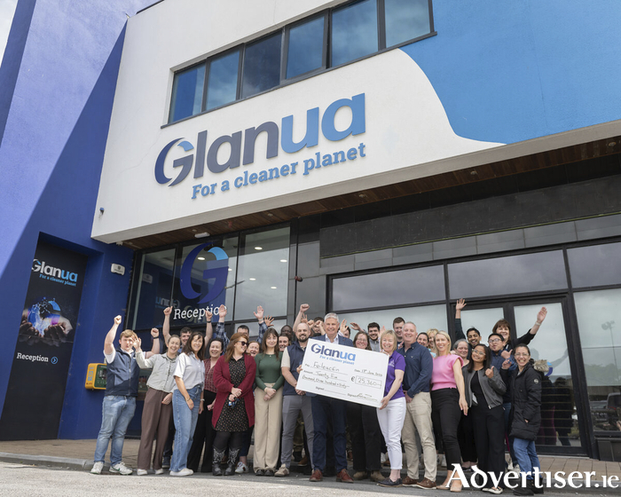 Members of the Glanua team at Railway House, Loughrea, led by Group Managing Director Karl Zimmerer, present a cheque for &euro;25,350 to Jacinta Murphy of F&eacute;ileac&aacute;in following the company's annual Golf Classic fundraiser.