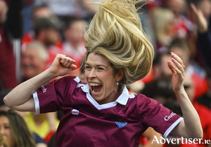Hair-raising: A Galway supporter, in the Hogan Stand, celebrates a late score during the Tribesmen's thrilling display against Cork in last Saturday's All-Ireland Senior Championship semi-final match at Croke Park in Dublin. Photo: Sportsfile