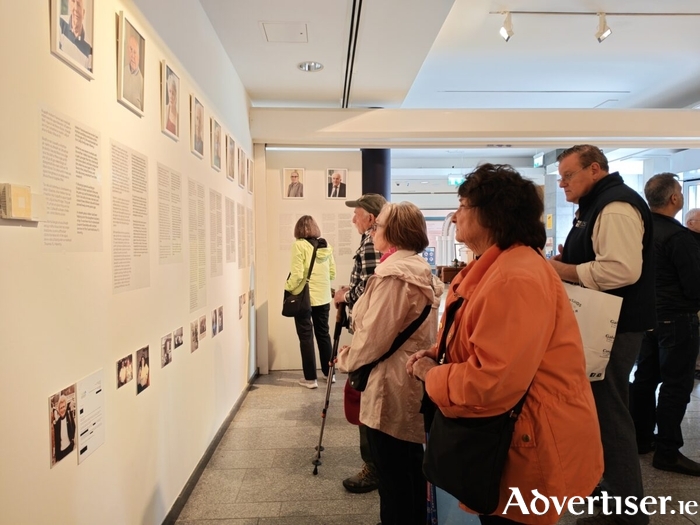 US tourists pictured viewing the installation at Galway City Museum.