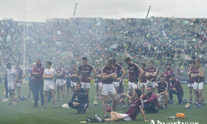 August 19, 2018: The dejected Galway team are seen through the smoke from fireworks after the GAA Hurling All-Ireland Senior Championship Final match between Galway and Limerick at Croke Park in Dublin. Photo by Brendan Moran/Sportsfile
