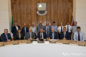 Pictured at the contract signing for the construction of a new fire station in Loughrea, left to right, Minister of State Se&aacute;n Canney, TD; Cathaoirleach of Loughrea MD, Cllr Geraldine Donohue; Liam Conneally, Chief Executive, Galway County Council; Cathaoirleach Cllr. Andrew Reddington; Michael Burns, Burns Construction &amp; Civil Engineering Ltd.; Director of Services Uinsinn Finn; Brian Cassidy, Quantity Surveyor. Back left to right, Cllr Ivan Canning; Brian Fahy, Senior Architect; Cllr Michael Regan; Cllr Declan Kelly; Cllr Moegie Maher; Gary Keane, QS Burns Construction; Michelle Hennelly, Senior Assistant Chief Fire Officer; Michael Ward, Loughrea Fire Station Officer; Maurice Headd, Galway Fire. Photo credit: Murtography.