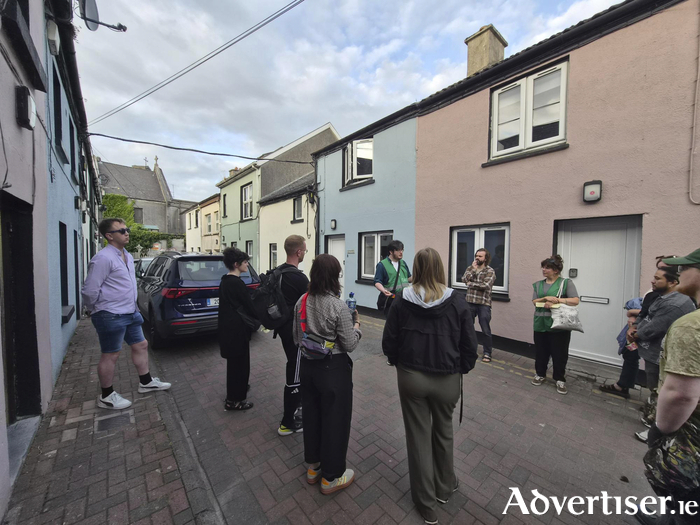 CATU activists addressing a walking tour on St Patrick's Avenue off Eyre Square 