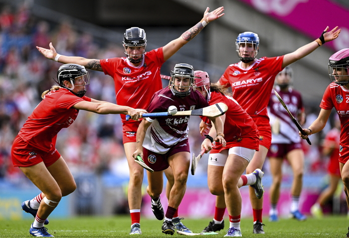 Aoife Donohue of Galway is swarmed by Cork players, Laura Treacy, Ashling Thompson, Aoife Healy and Sorcha McCartan during the Glen Dimplex All-Ireland Senior Camogie Championship final. (Photo by Ramsey Cardy/Sportsfile)