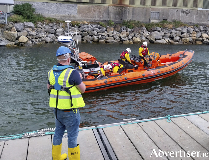 Galway RNLI volunteer crew of M&aacute;irt&iacute;n Folan, Eoin Carey, Leo Branagan and helm James Rattigan on the lifeboat on the way to Aughinish on the south shore of Galway Bay, west of Kinvara to rescue a lone sailor on board a 25 foot sailing boat which had gone aground and was taking on water. Pierce Purcell (on the pontoon) provided shore crew support for the launch.&nbsp;