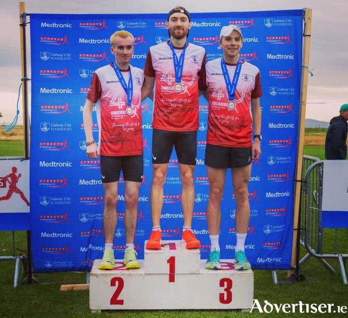 Men's Streets of Galway 8k podium finishers. Thomas McStay (1st), William Fitzgerald (2nd), Jamie Fallon (3rd).