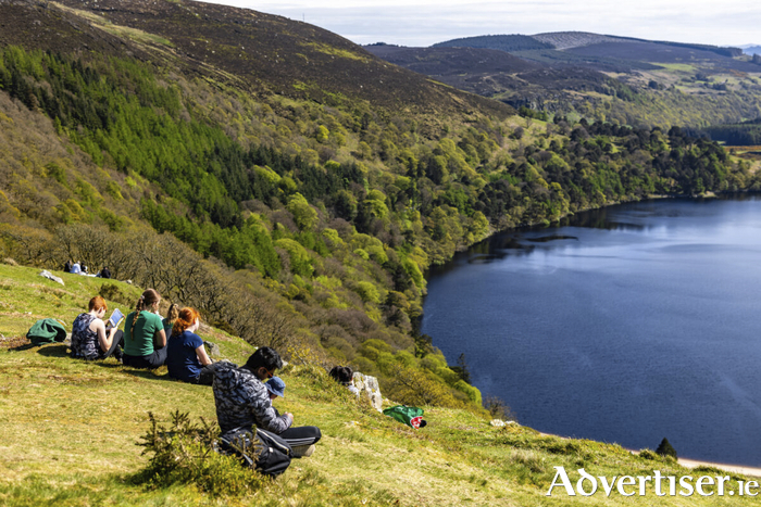 Lough Tay in the Wicklow Mountains a place to rest and admire the views on a sunny spring day