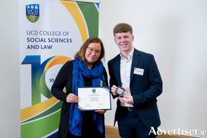 Jordan Simpson receiving an academic award for his second-year grades at UCD.