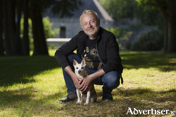 Radio presenter and broadcaster Rick O&rsquo;Shea with his adopted dog TJ at the launch of The Irish Blue Cross' new Pet Loss Support freephone service. Photograph: &copy;Fran Veale