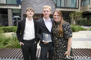 The winners of the Young Journalist Ireland Awards, run by NewsBrands Ireland, were announced at a ceremony in the Dublin Royal Convention Centre, celebrating the outstanding work of Transition Year students from across the country. Hosted by journalist Roisin Ingle, prizes were awarded across six categories: Features, Opinion, Sports Journalism, Photojournalism, Podcast, and School Newspaper. Pictured are Fionn Kortmann, Lee Kortmann and Margaret Lee at the presentation of the winning awards for Young Journalist of the year 2026. Lee won top prize in the Sports category for his fantastic piece on rowing called "Ritual of the River".