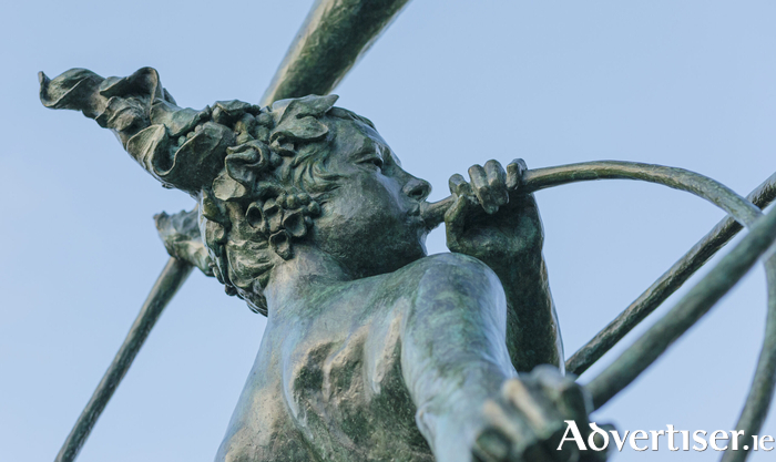 A sneak peak of &lsquo;Gailbhe&rsquo;. The full-height nude female in stylised bronze with an aged patina stands gracefully atop a fluvial boulder. With her hair backswept by riverine wind, she plays a carnyx-like horn toward the city and bay bearing her name. 