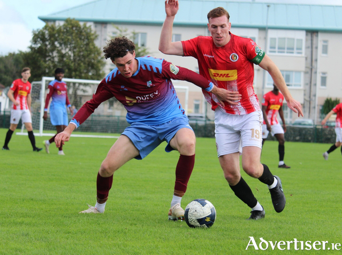 Mervue United's Donnacha McNamara in action against Lucan United last weekend. (Photo: Sam Murphy @ SamSportsActionMedia)