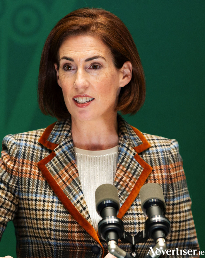 Minister Hlldegarde Naughton
	
