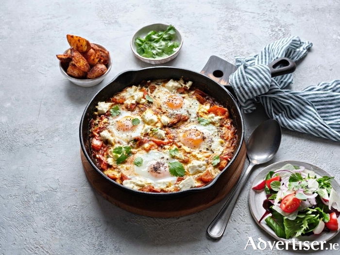 Baked Eggs with feta and harissa.