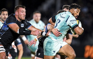 Bundee Aki of Connacht against Glasgow's Matt Fagerson and Rory Darge during the United Rugby Championship match between Glasgow Warriors and Connacht at Scotstoun Stadium in Glasgow, Scotland. (Photo by Rob Casey/Sportsfile)