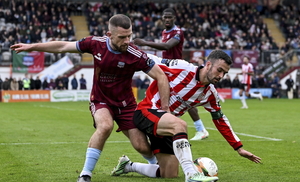 Michael Duffy of Derry City in action against Aaron Bolger of Galway United during the Club Orange Men's FAI Cup semi-final match between Galway and Derry City at Eamonn Deacy Park in Galway. (Photo by Stephen McCarthy/Sportsfile)