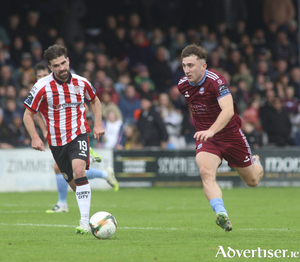 Ed McCarthy and Brandon Fleming in action from the Club Orange Men's FAI Cup semi-final at Eamonn Deacy Park. (Photo: Mike Shaughnessy)