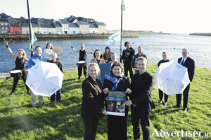 Sponsors and supporters of Tonnta 2027 gather for a photo at the launch of the festival&rsquo;s headliners, with some of the artists set to feature in the 2027 programme pictured in the background. Front row (L&ndash;R): Sally-Ann O&rsquo;Brien and Richie McCarthy, Galway City Council, with Br&iacute;d N&iacute; Chongh&oacute;ile, Gaillimh le Gaeilge, organisers of Tonnta 2027. Back row (L&ndash;R): M&aacute;irt&iacute;n &Oacute;g Lally, Lally Tours; Majella N&iacute; Chr&iacute;och&aacute;in, IMRAM; Clodagh Carey and Janice Lyons, Carey Building Construction; David Hayes, Ask Acorn; and Lisa Stewart and Ted Coyle, Claddagh Credit Union.