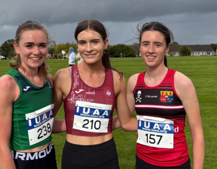 Winner Neasa Ni hAinifein of University of Galway centre, with UL 2nd placer Claire O'Grady on the left and UCC athlete Saoirse Twomey in 3rd on the right.