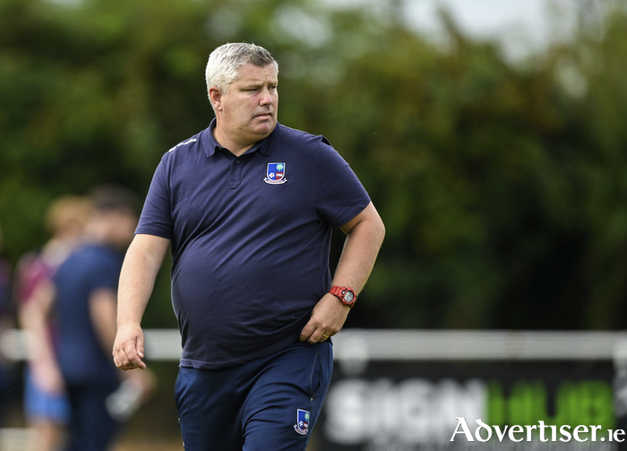 Mervue United manager Brendan O'Connor stands on the pitch before the FAI 
National League match. (Photo by Eakin Howard/Sportsfile)