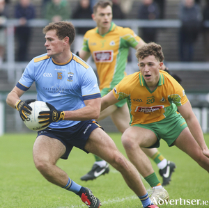 Salthill / Knocknacarra&rsquo;s Charlie Power and 
Corofin&rsquo;s Aaron Looney in action from the Bon Secours Galway Football Senior Club 
Championship semi-final at Pearse Stadium on Sunday. Photo: Mike Shaughnessy