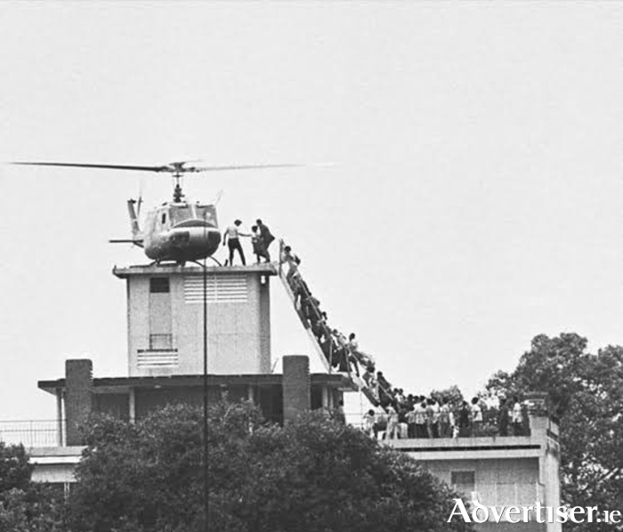 Grianghraf c&aacute;ili&uacute;il Hubert Van Es den heileacaptar i Saigon