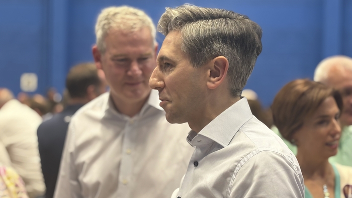 Simon Harris pictured with Sean Kyne after he arrived at the Galway Lawn Tennis Club.