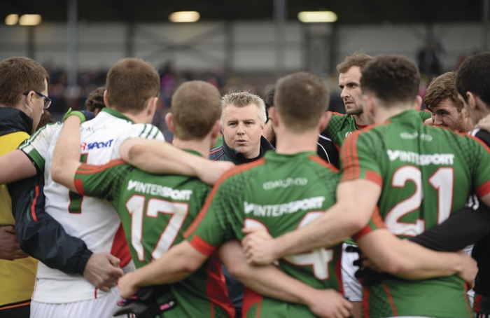 Stephen Rochford speaks to the Mayo team after the final whistle in Cork. Photo: Sportsfile