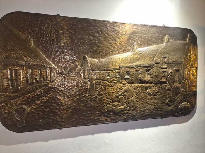 A copper image of The Claddagh by S&eacute;an Power hanging in Ward's Hotel. Photo: Maxim Kelly